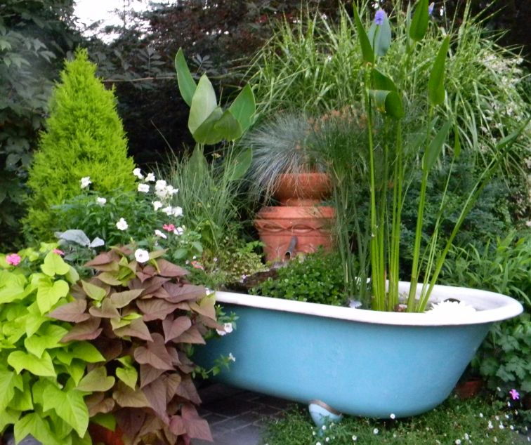 bathroom-gardening-using-recycled-bathtub-as-plant-pot-garden-bathtub.jpg